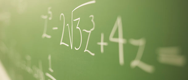 Calculations written on chalkboard